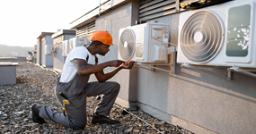 Home Maintenance in Dubai Repairing Air Conditioner